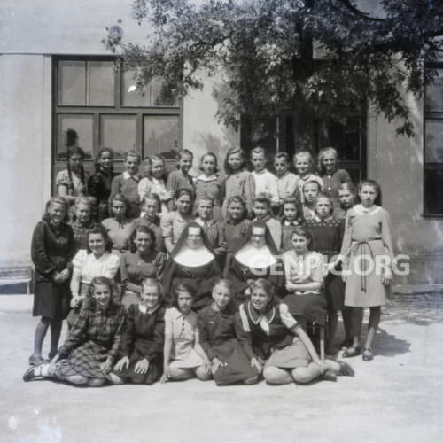 Students of an all girls' school and nuns.