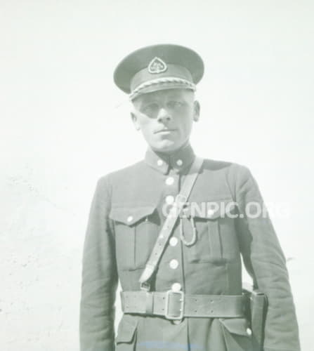Portrait of a man in uniform.