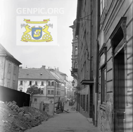 Ruins of the neolog synagogue on the left the. Pharmacy Salvator on the right.