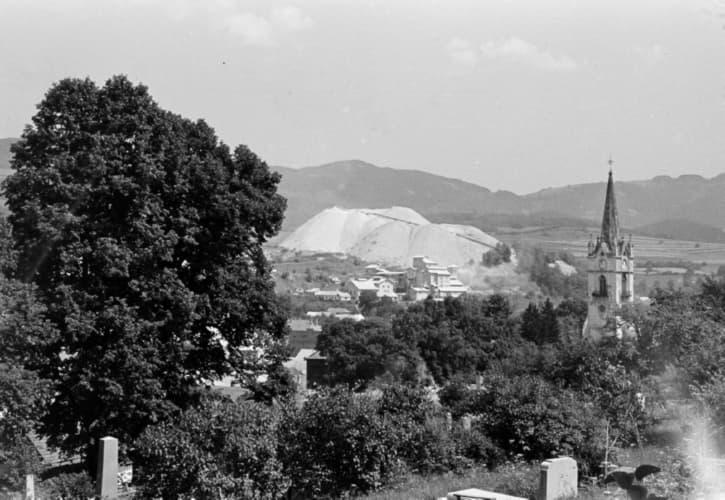 Panorama of the city. Mine and asbestos processing plant. Evangelical Church.