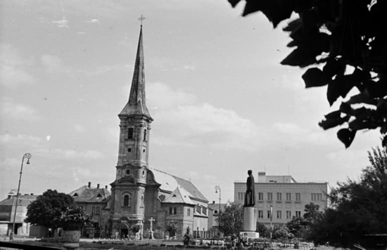 Statue of Anton Bernolak and Roman Catholic Church of the Exaltation of the Holy Cross.