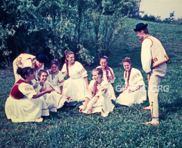 Youth in folk costumes.