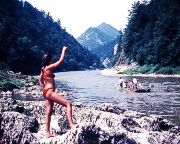 Posing and floating the Dunajec on wooden raft.